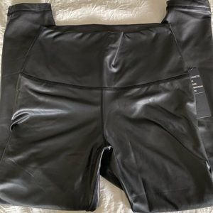 NEW women’s black faux leather leggings.